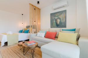 Ein Sitzbereich in der Unterkunft Rental Holidays Apartment