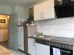 Kuchyň nebo kuchyňský kout v ubytování Landhaus Heidekrug