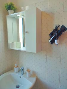 Koupelna v ubytování F.A.M. ROOMS