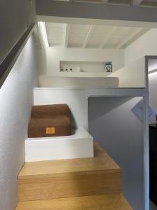A bed or beds in a room at Lola Loft