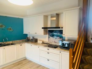 Køkken eller tekøkken på 5 Lansdowne Manor