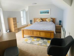 En eller flere senge i et værelse på 5 Lansdowne Manor