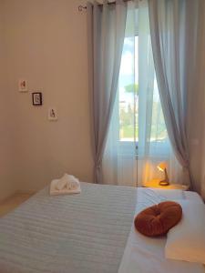 Postel nebo postele na pokoji v ubytování F.A.M. ROOMS