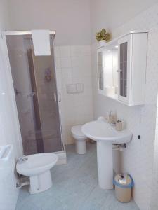 Koupelna v ubytování F.A.M. ROOMS