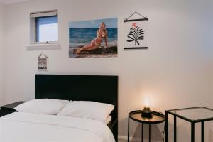 Ένα ή περισσότερα κρεβάτια σε δωμάτιο στο Waterfront Home Rockingham