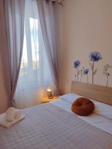 Postel nebo postele na pokoji v ubytování F.A.M. ROOMS