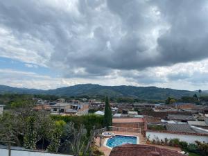 a view from the roof of a building with a city at Hotel San Vicente in Darién