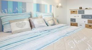 מיטה או מיטות בחדר ב-SK Apartments -Apartment mit 2 Schlafzimmern
