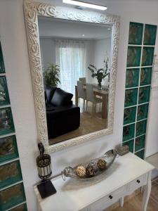 Et tv og/eller underholdning på Alenia Apartments