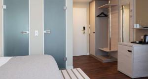 Best Western Hotel St. Michael客房内的一张或多张床位