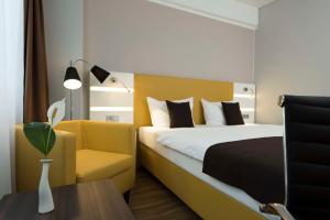 Postel nebo postele na pokoji v ubytování Best Western Hotel Braunschweig Seminarius + 28 fotografií