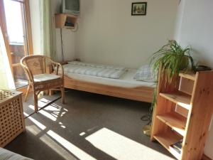 Ένα ή περισσότερα κρεβάτια σε δωμάτιο στο Zum Horizont