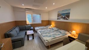 Postel nebo postele na pokoji v ubytování Apartmány Velvet