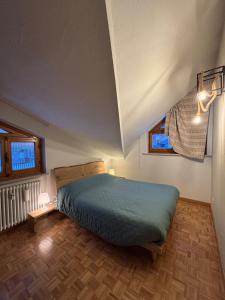 Postel nebo postele na pokoji v ubytování Ponte Nana - 200mt dagli Impianti Limone