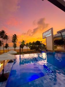 A piscina localizada em Netuanah Praia Hotel ou nos arredores
