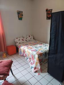 Ένα ή περισσότερα κρεβάτια σε δωμάτιο στο Residencial Aryton Senna