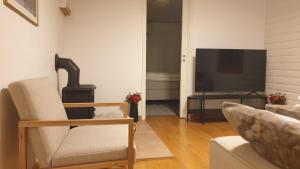TV a/nebo společenská místnost v ubytování Apartment near the Sea