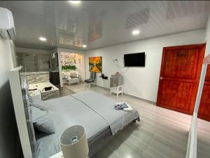 Voodi või voodid majutusasutuse Inmaculada Real Hotel toas