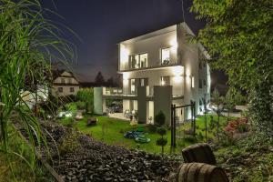 Vonkajšia záhrada v ubytovaní Nowoczesne Apartamenty typu Superior - Bulwary Rabka Zdrój - Balia - Blisko Park Zdrojowy