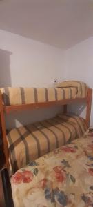 Postel nebo postele na pokoji v ubytování Departamentos de Ostende