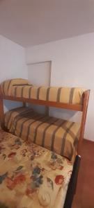 Postel nebo postele na pokoji v ubytování Departamentos de Ostende