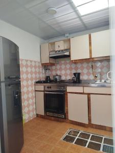 Kuchyň nebo kuchyňský kout v ubytování Serene Home