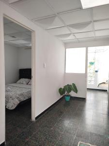 Postel nebo postele na pokoji v ubytování Serene Home