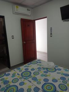 Voodi või voodid majutusasutuse Inmaculada Real Hotel toas