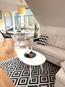 Posezení v ubytování Ferienwohnung Idylle auf Fehmarn II