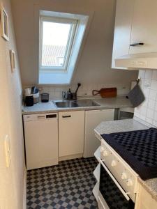 Kuchyň nebo kuchyňský kout v ubytování Ferienwohnung Idylle auf Fehmarn II + 2 fotografie