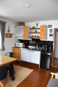 Kuchyň nebo kuchyňský kout v ubytování 4 Elements Appartmenthaus Monarda