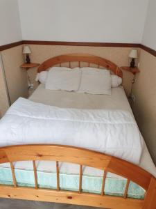 Ένα ή περισσότερα κρεβάτια σε δωμάτιο στο Appartement plein centre