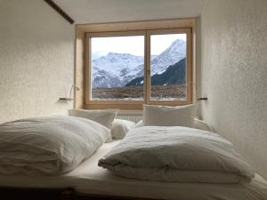 Postel nebo postele na pokoji v ubytování Chalet Wasserfall 3-Zimmerferienwohnung möbliert