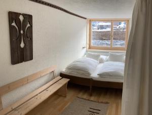 Postel nebo postele na pokoji v ubytování Chalet Wasserfall 3-Zimmerferienwohnung möbliert
