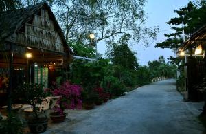 Zahrada ubytování BOSA Homestay - Mekong Riverside