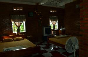 TV a/nebo společenská místnost v ubytování BOSA Homestay - Mekong Riverside