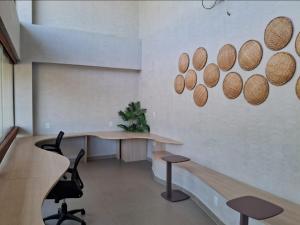 Οι επιχειρηματικές εγκαταστάσεις ή/και οι αίθουσες συνεδριάσεων στο Malia Beach Experience - Studio próximo ao mar +56 φωτογραφίες