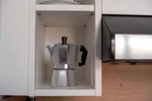 Kuchyň nebo kuchyňský kout v ubytování Várfal-Lak apartman