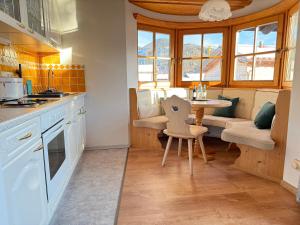 Kuchyň nebo kuchyňský kout v ubytování Alpenflair Apartments