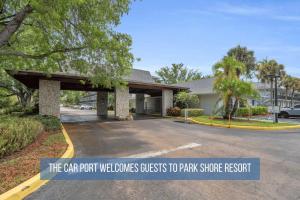 a carport welcomes guests to play store resort at Walk From Lanai to Pool and More in Naples
