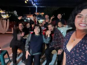 a group of people posing for a picture at a party at Mi Atardecer en Tepoz, Hostal in Tepoztlán