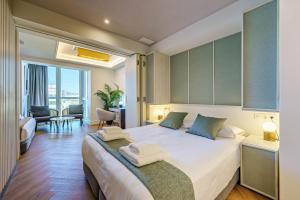 Gran Alameda Centro客房内的一张或多张床位