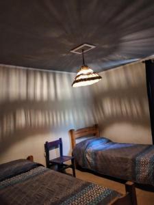 Ένα ή περισσότερα κρεβάτια σε δωμάτιο στο Casita serrana +10 φωτογραφίες