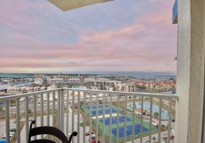 En balkon eller terrasse på Estero Beach & Tennis 1201-A by Sun Palace Vacations