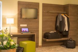 TV a/nebo společenská místnost v ubytování Hotel Jakob Regensburg DownTown, Best Western Signature Collection