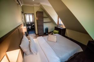 Postel nebo postele na pokoji v ubytování Hotel Jakob Regensburg DownTown, Best Western Signature Collection
