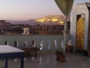 a balcony with a view of a mountain at Villa Rebecca in Luxor