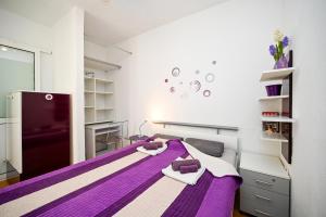 En eller flere senge i et værelse på Apartment Bazen + 11 billeder