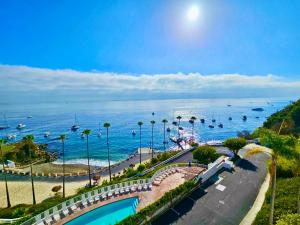 a view of the ocean and a beach with boats at Hillside Avalon escape w pool & panoramic views in Avalon