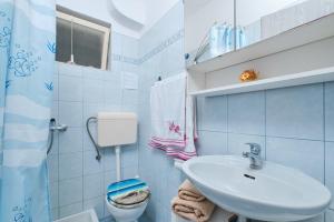 Kúpeľňa v ubytovaní Apartment Giuseppe + 30 fotografií